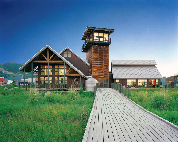 back exterior view of the swaner eco-center and walkway into the the preserve